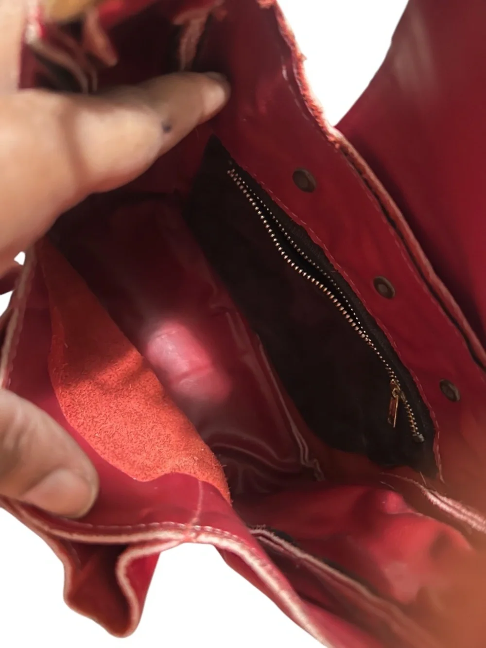Vintage Handmade Red leather hobo-style shoulder bag featuring a woven strap